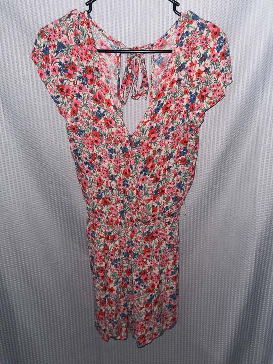 American Eagle Pants - American Eagle Floral V-Neck Backless Romper with Tie Detail